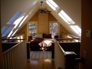 master-bed-in-loft-with-large-timbers-glass-floor-07