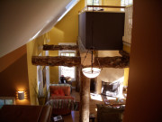 master-bed-in-loft-with-large-timbers-glass-floor-08